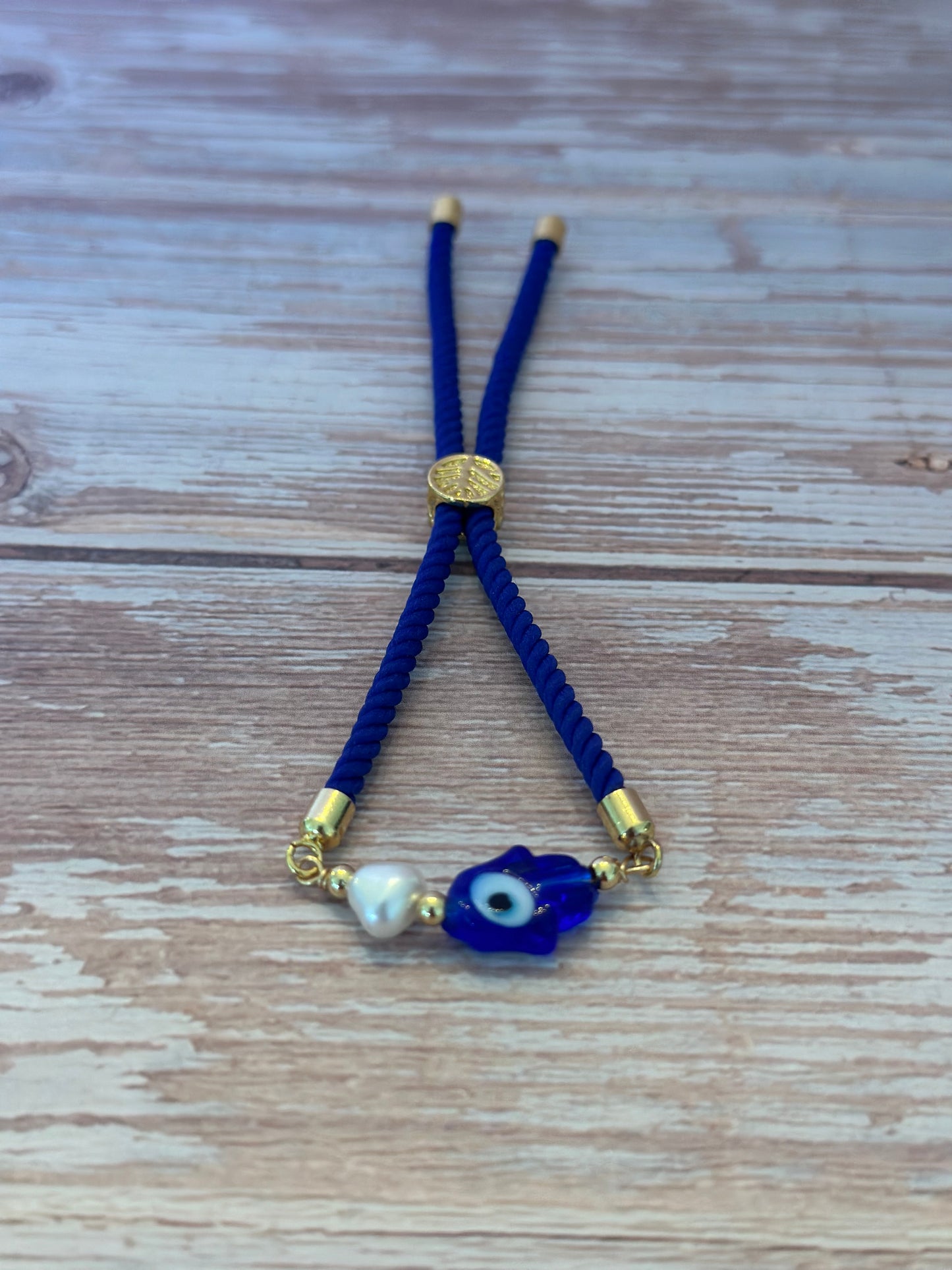Pulseras en cordón azul con dije Ojo turco 🧿