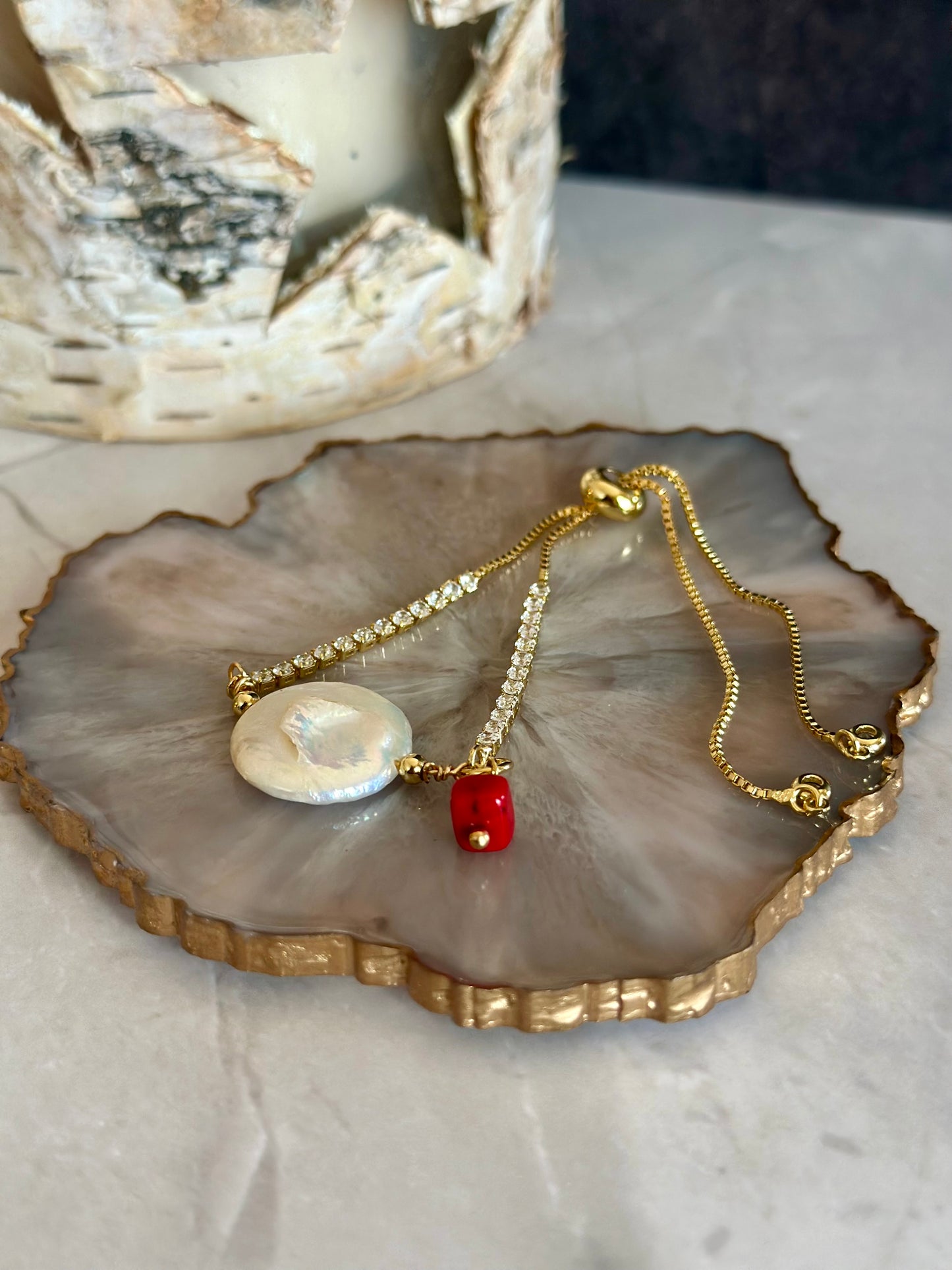 Pulseras en cadena con dije de Perla y coral