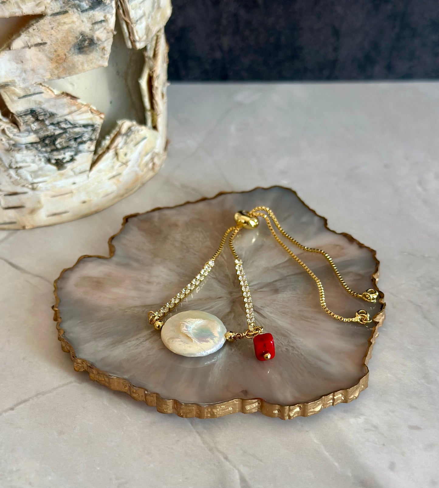 Pulseras en cadena con dije de Perla y coral