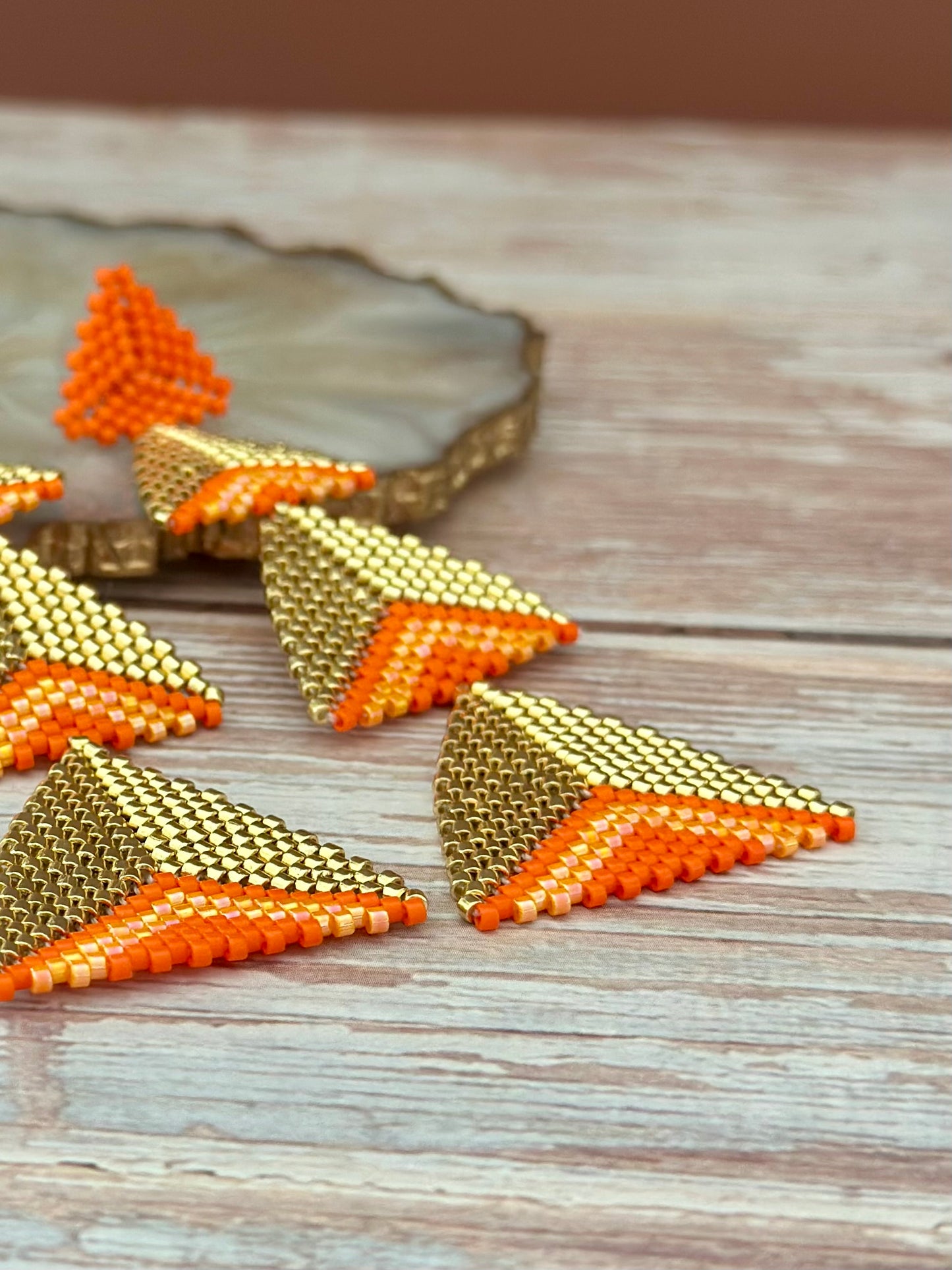 E- Aretes largos de Miyuki