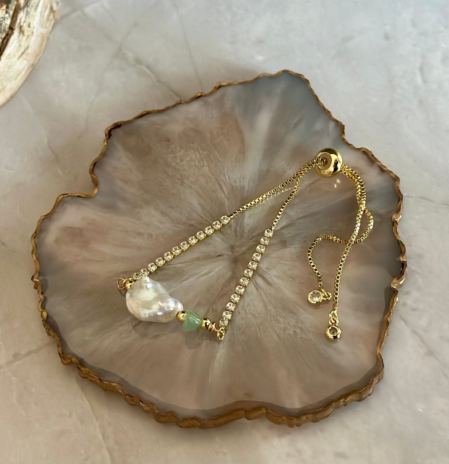 Pulseras en cadena con dijes de Perlas naturales