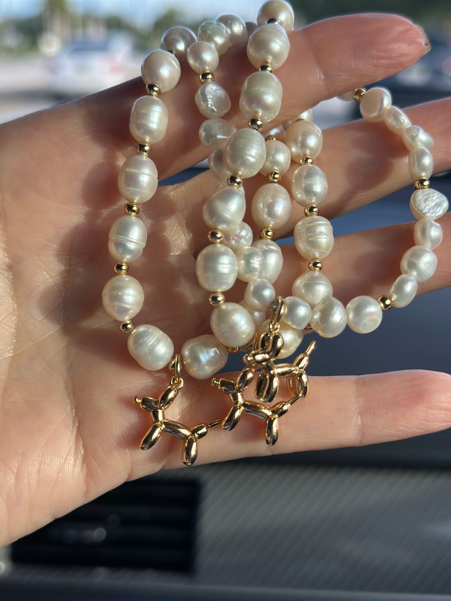 A- Pulseras de Perlas naturales y dije Canino ๐พ๐ถ