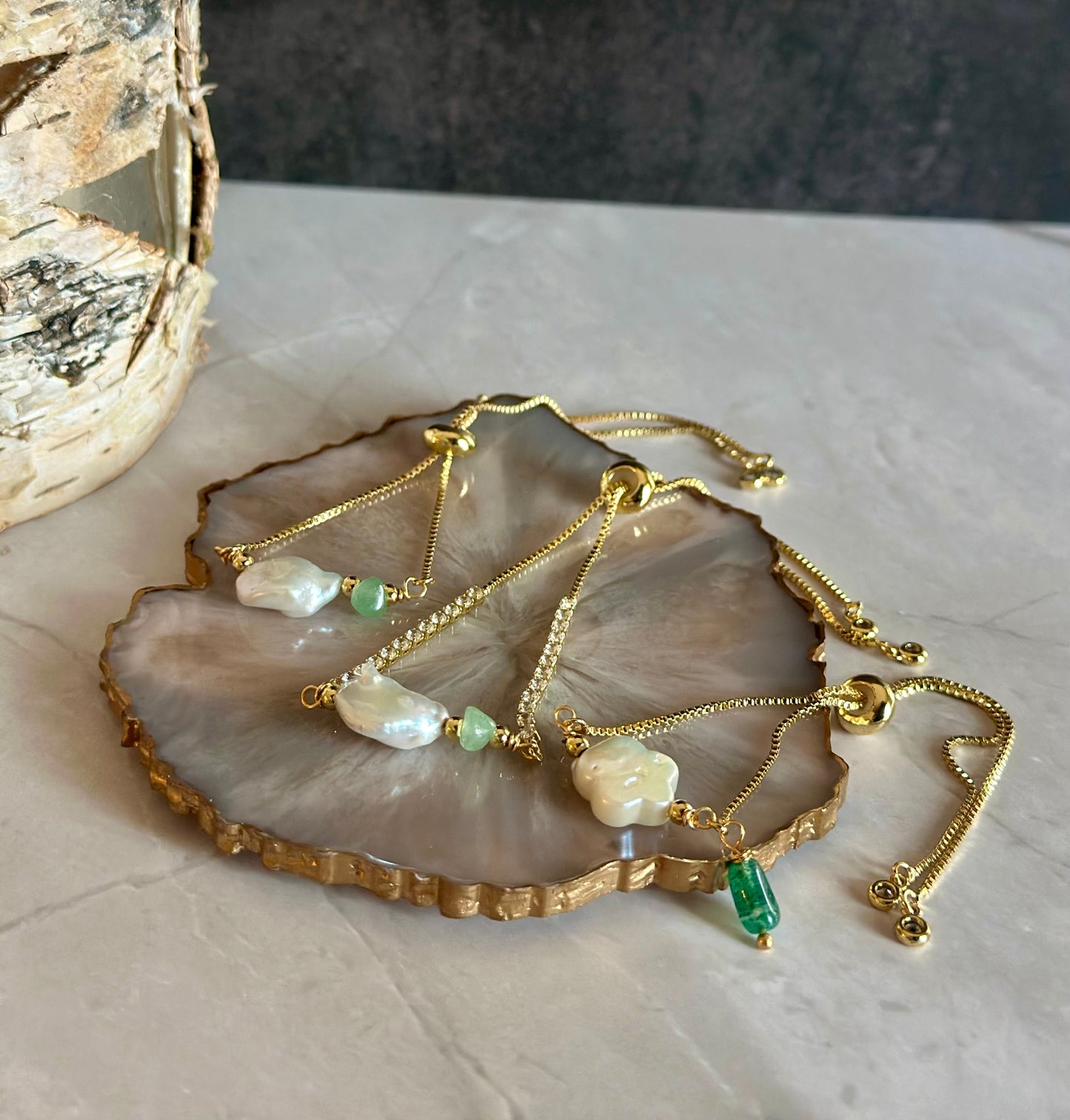 Pulseras en cadena con dijes de Perlas naturales