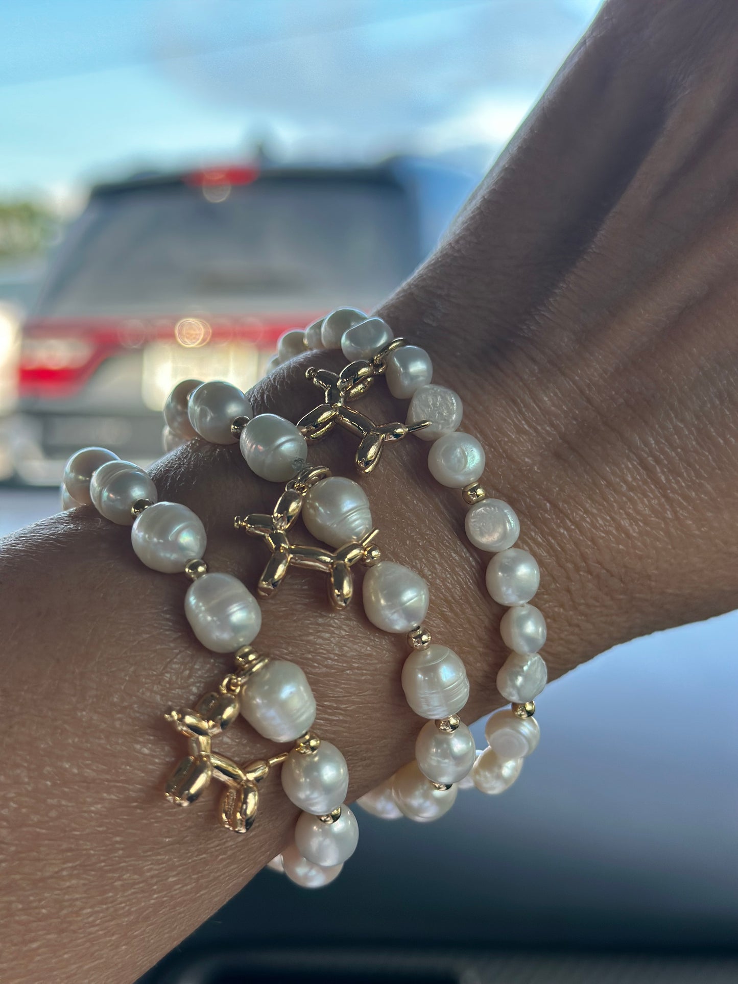 A- Pulseras de Perlas naturales y dije Canino ๐พ๐ถ