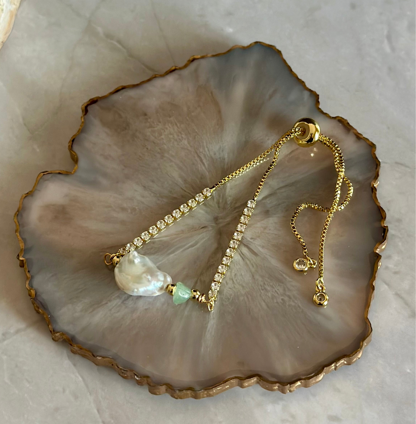 Pulseras en cadena con dijes de Perlas naturales
