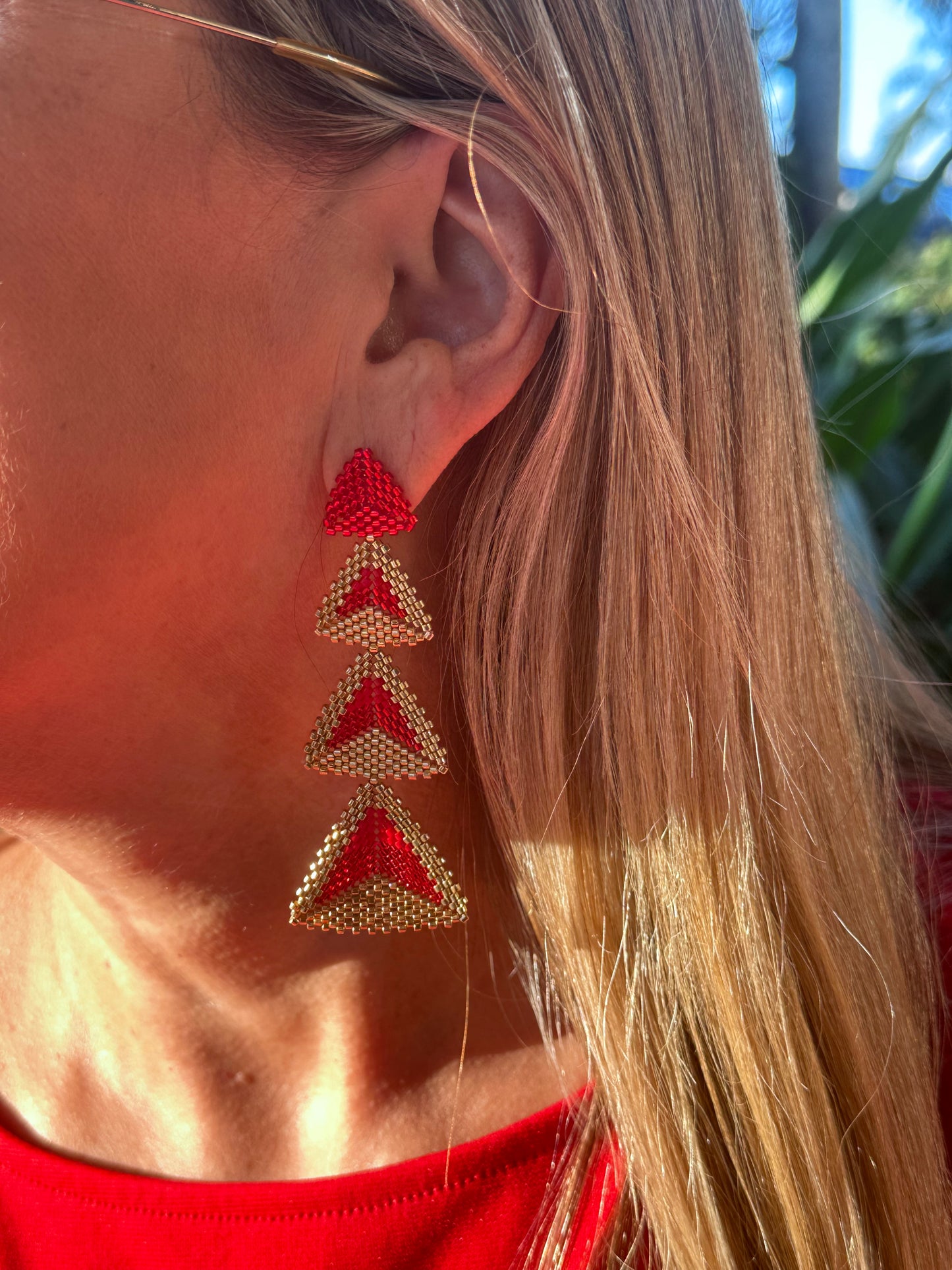 A- Aretes largos de Miyuki