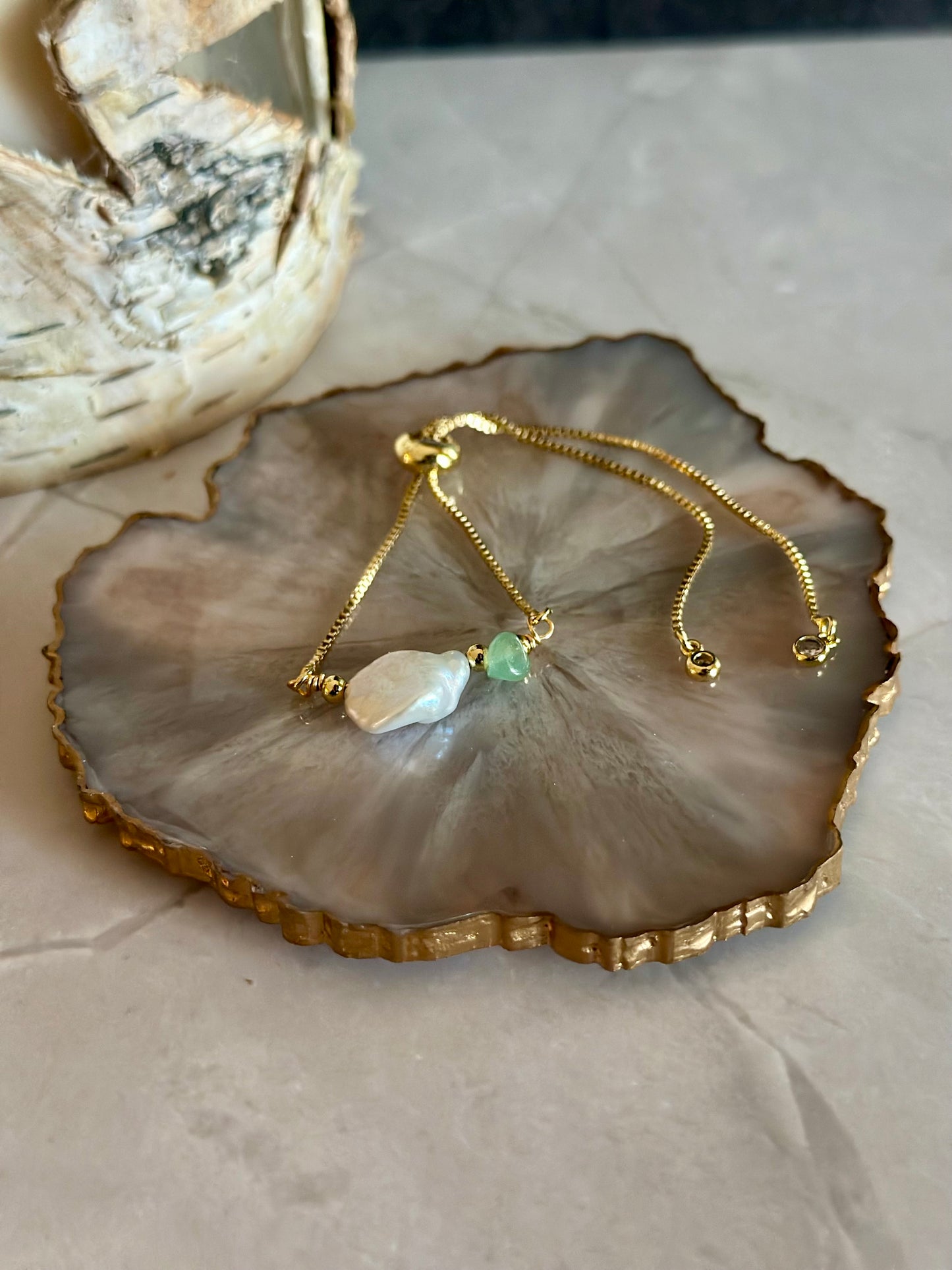 Pulseras en cadena con dijes de Perlas naturales