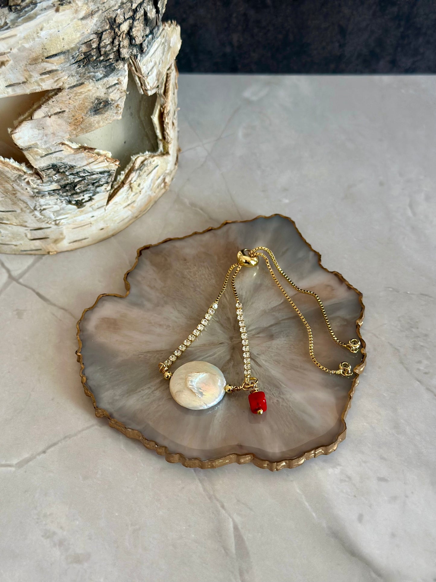Pulseras en cadena con dije de Perla y coral