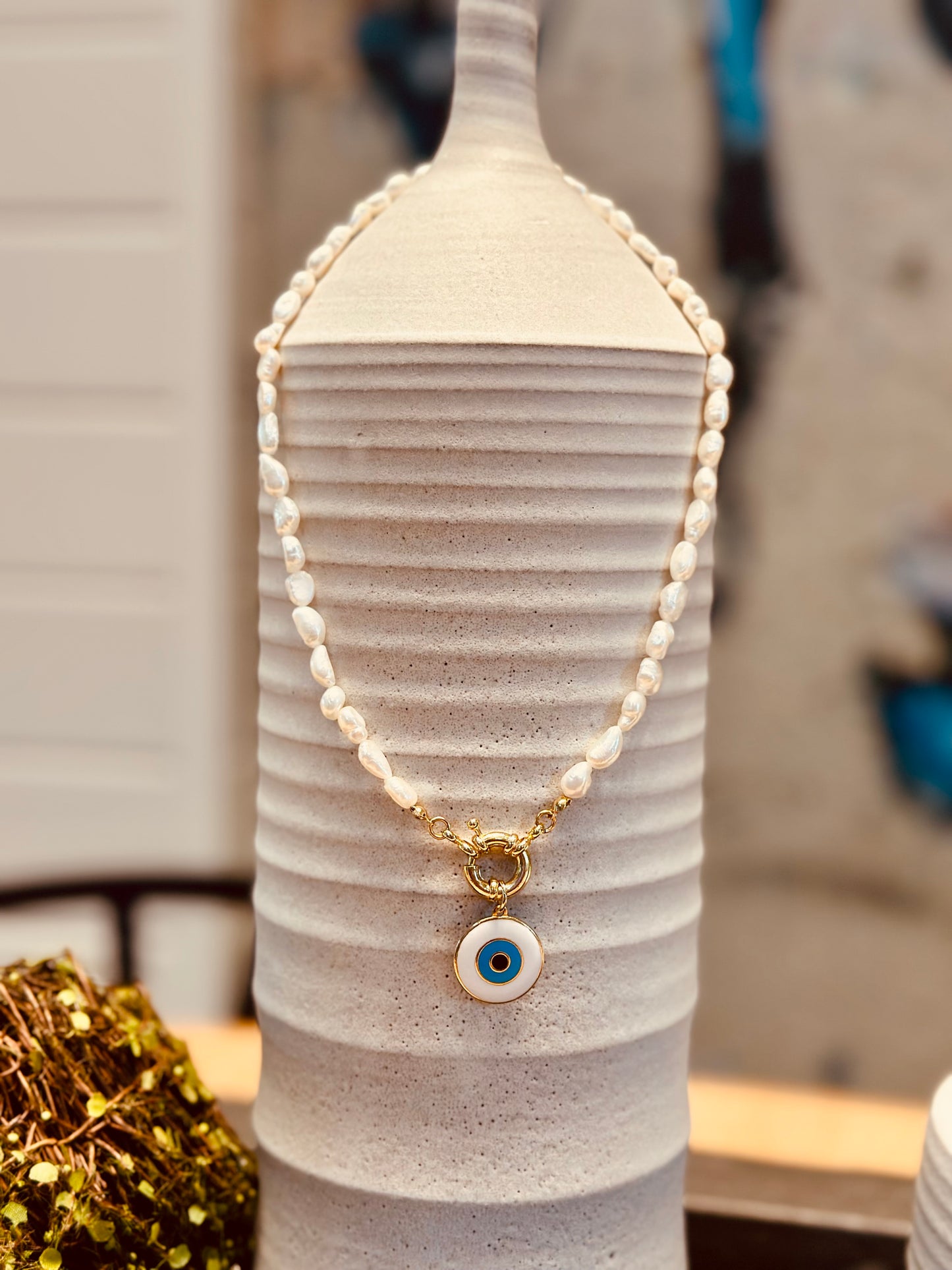 A Collar de Perlas naturales con dije de Ojo Turco 🧿