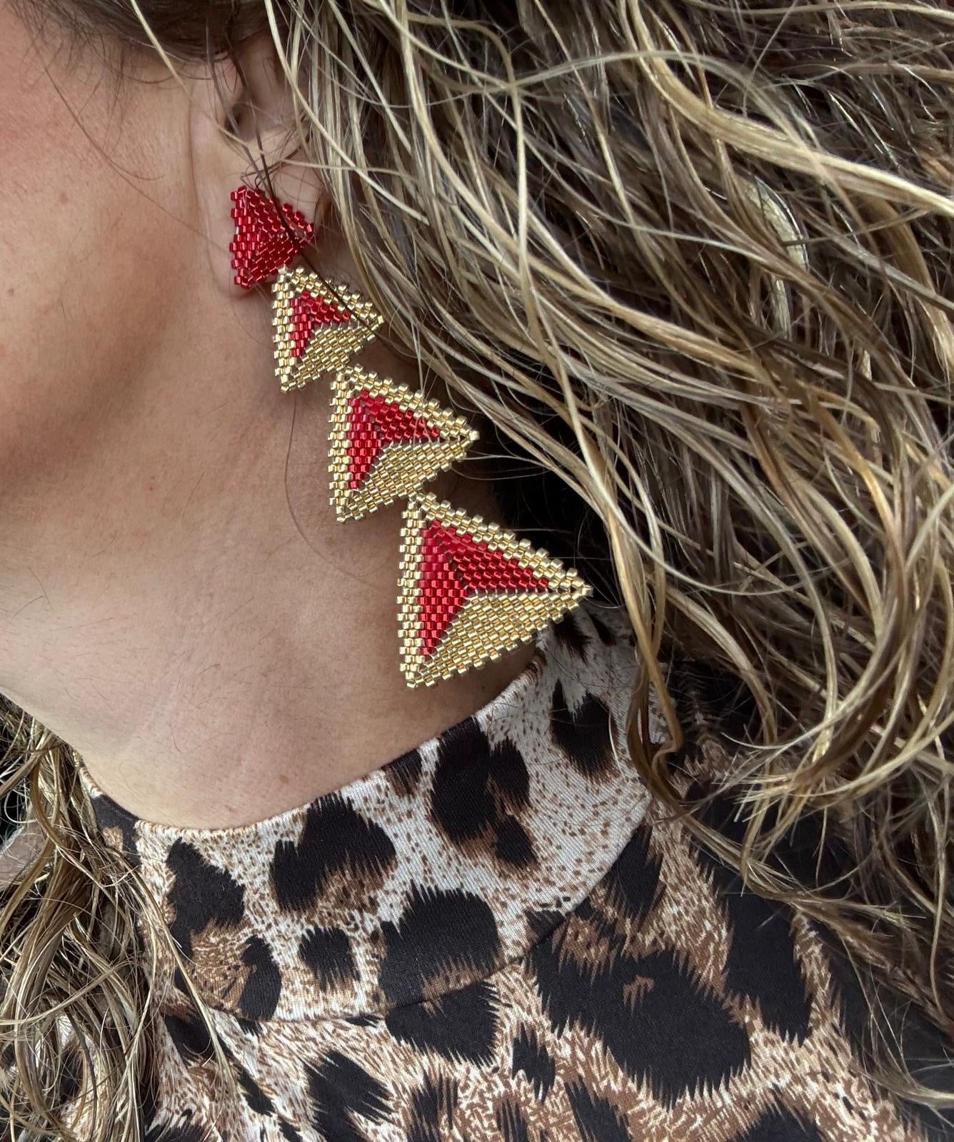 A- Aretes largos de Miyuki