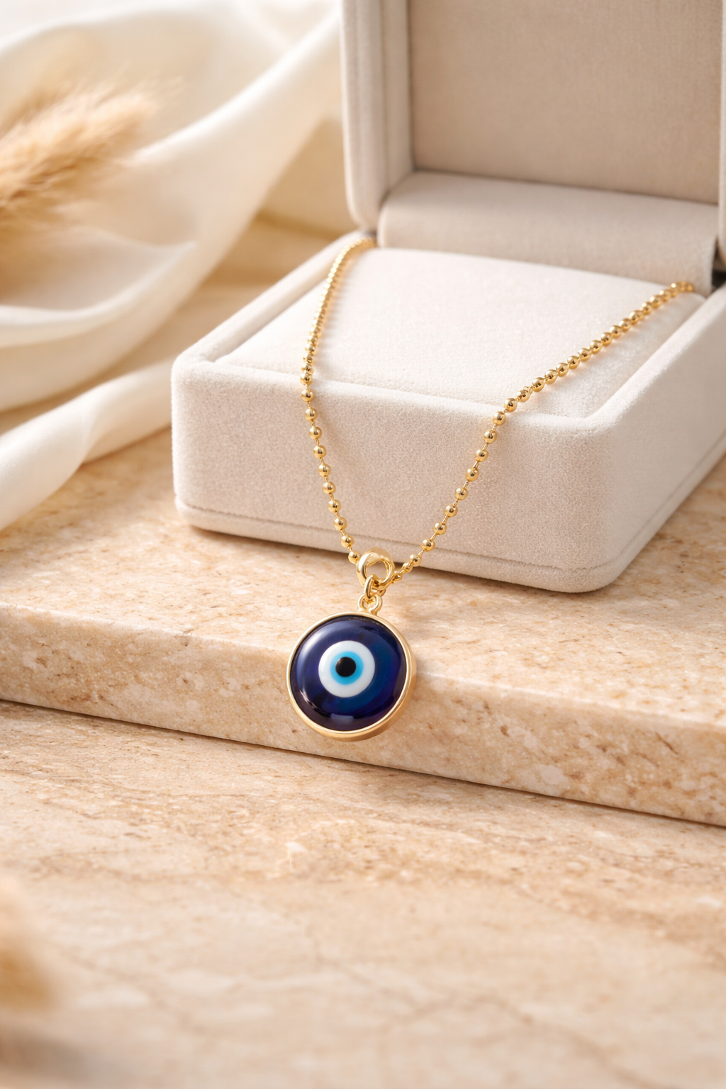 A Cadena estilo militar con baño de oro 18k y dije de Ojo Turco 🧿 (Murano)