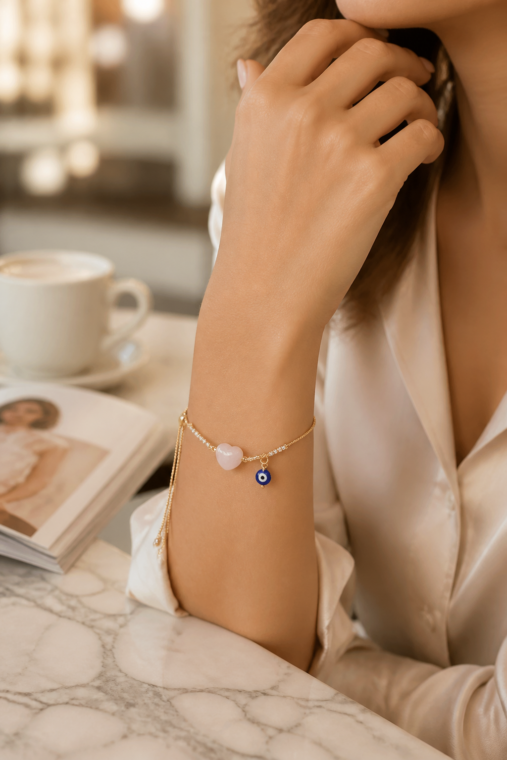 Pulsera de cadena con dije de ojo turco y corazón rosado