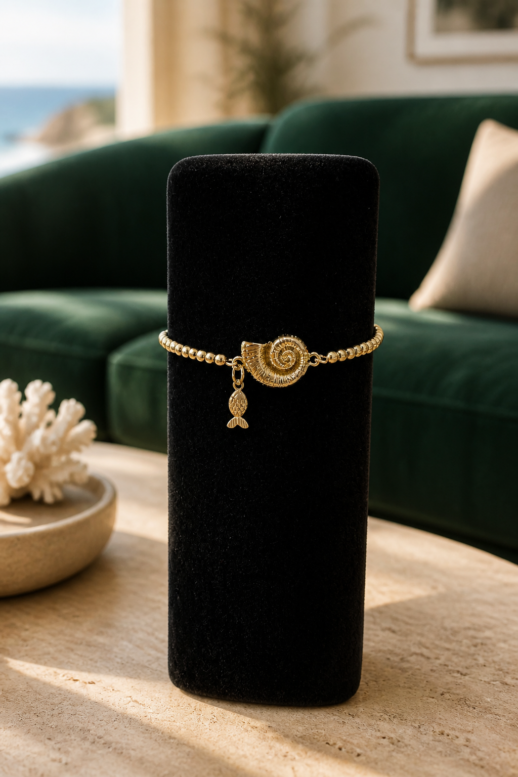 A Pulseras de cadena con dije de Caracol