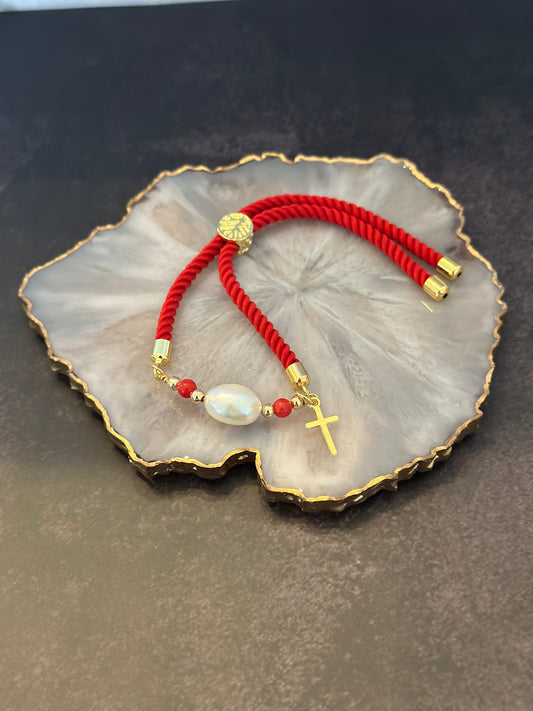 Pulseras en cordón rojo con perla natural