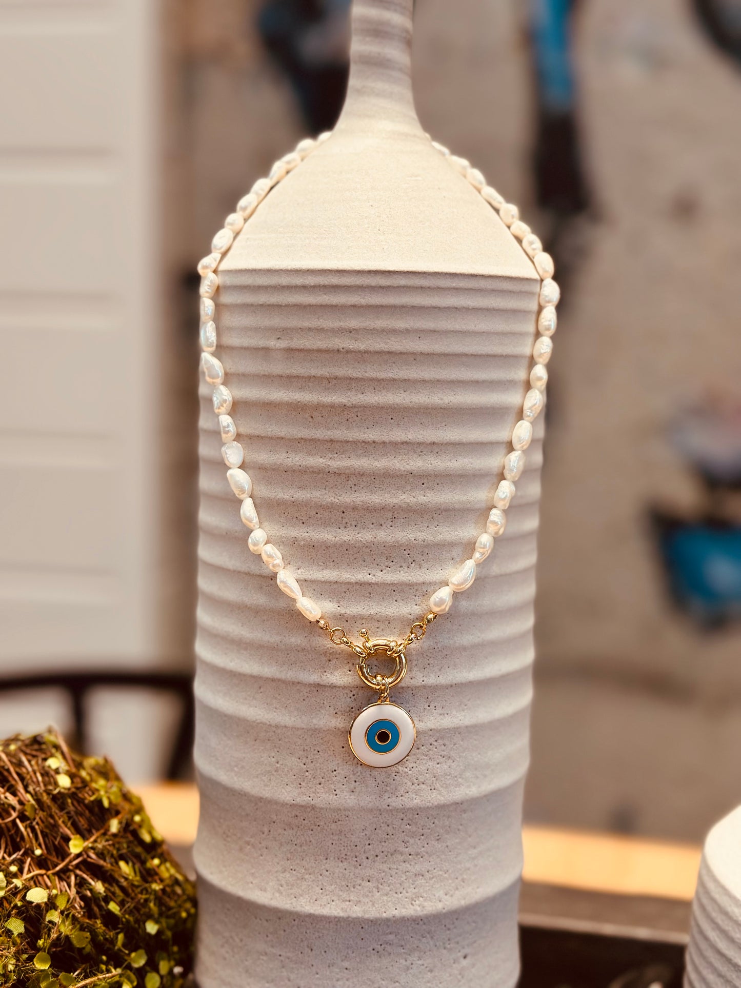 A Collar de Perlas naturales con dije de Ojo Turco 🧿