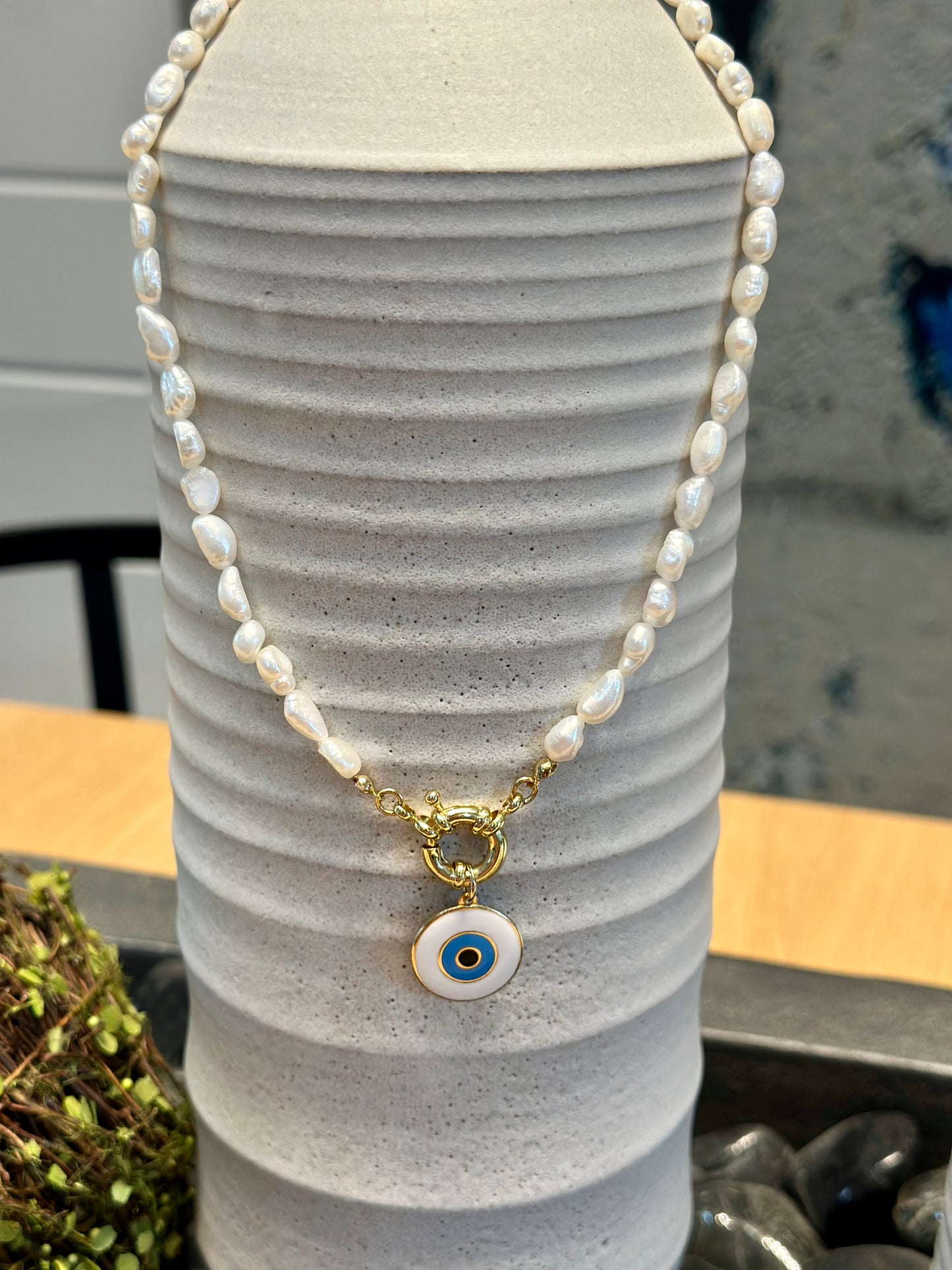 A Collar de Perlas naturales con dije de Ojo Turco 🧿