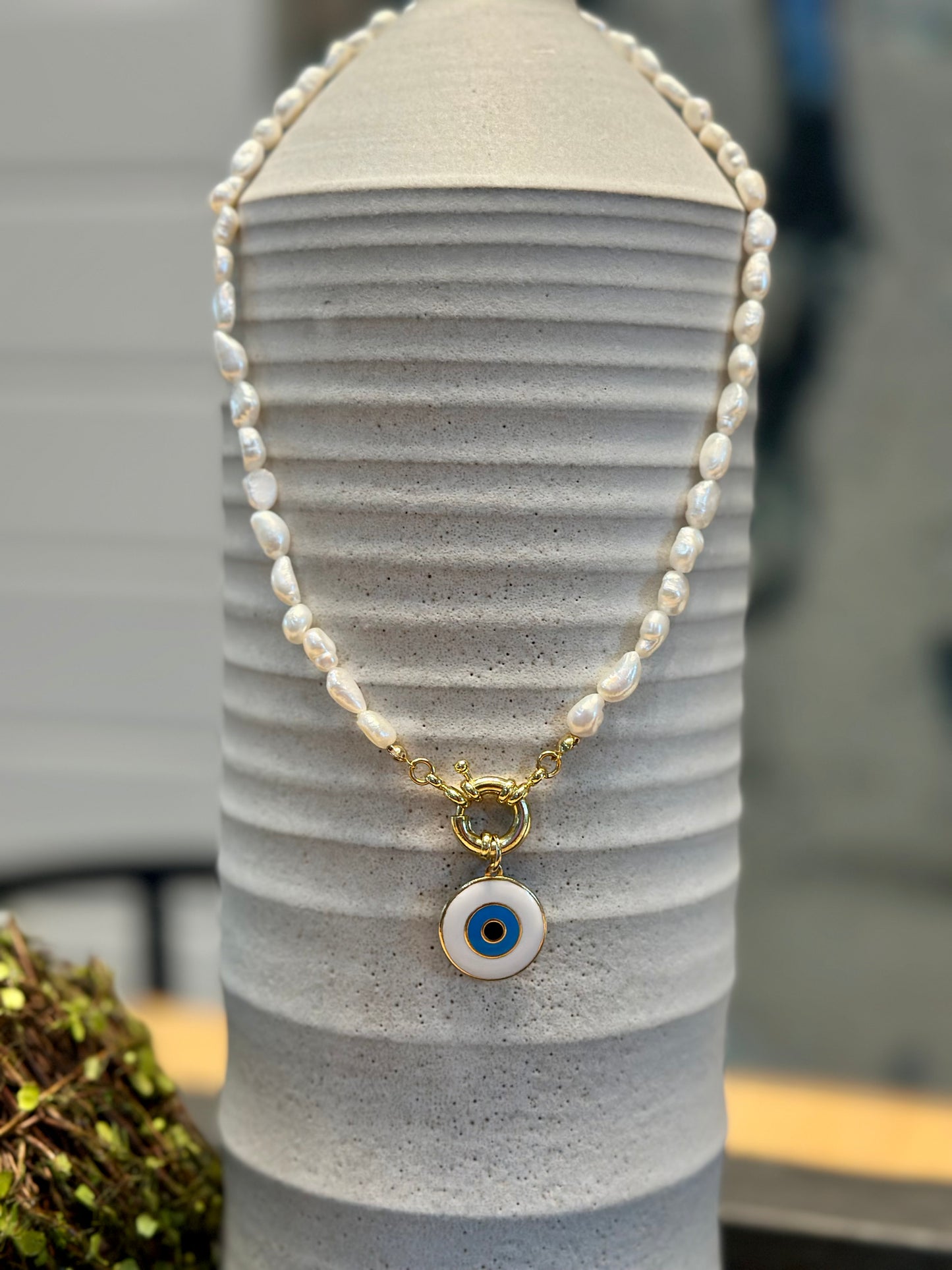 A Collar de Perlas naturales con dije de Ojo Turco 🧿