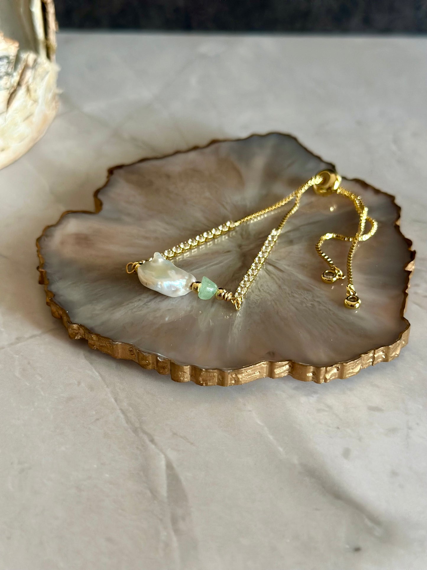 Pulseras en cadena con dijes de Perlas naturales