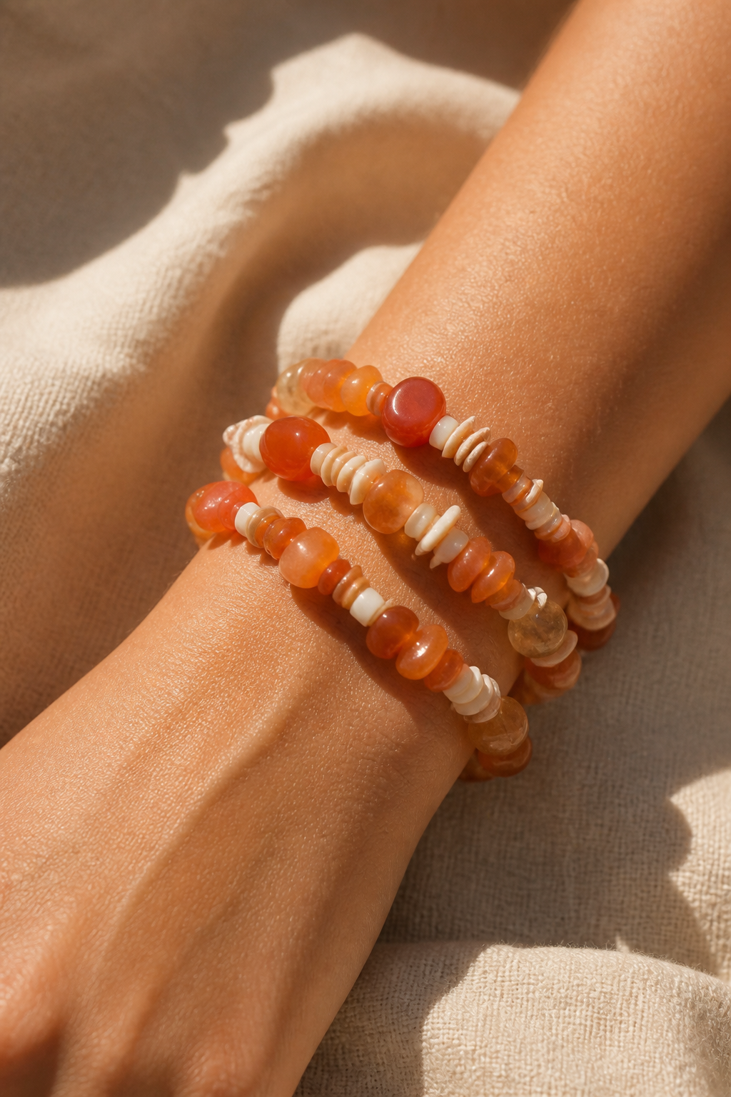 Pulseras de piedras Ámbar, coral y conchas marinas
