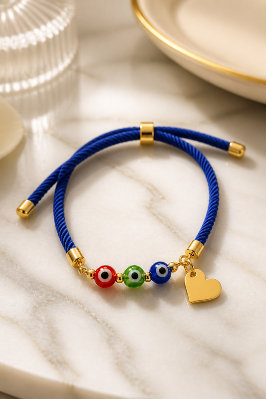 A Pulsera en cordón azul con dijes de ojos turcos 🧿