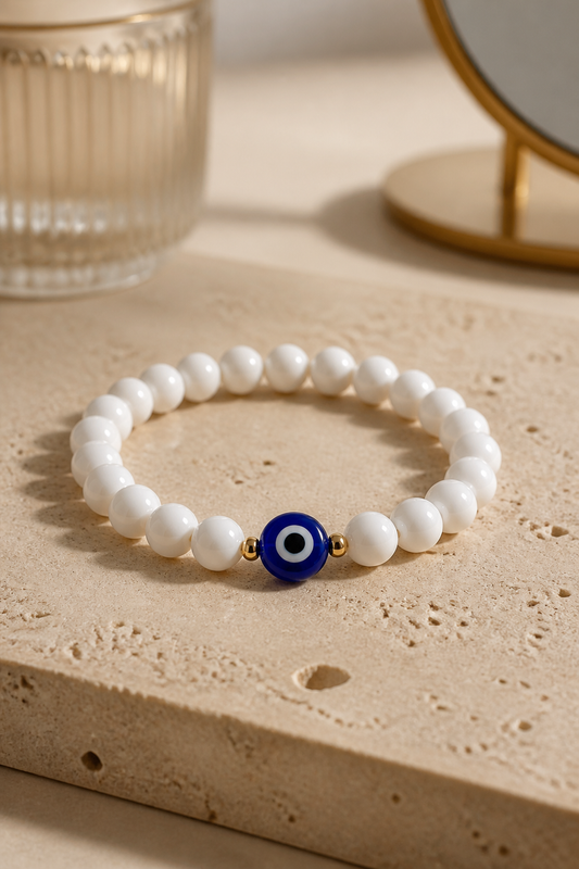 Pulsera de Coral blanco con dije de Ojo Turco 🧿